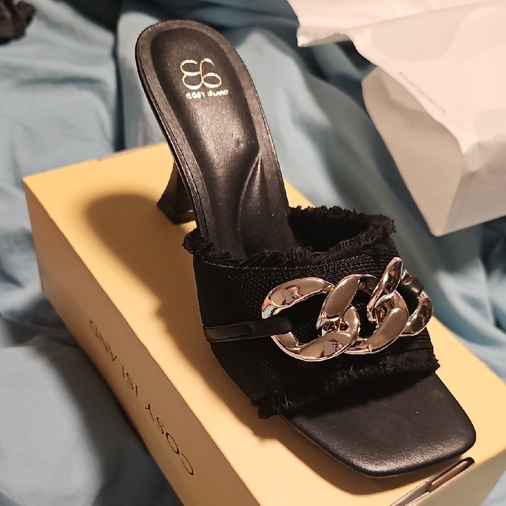 Chic Black Heeled Mules with Gold Chain Accent